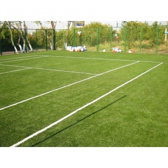 Укладка искусственной травы для игры в большой теннис